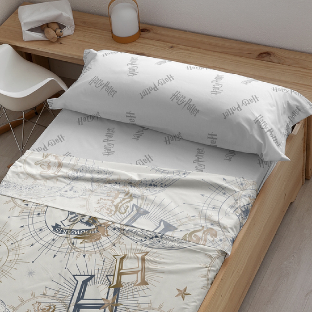 Juego de sábanas con almohada y bajera estampadas 100% algodón modelo hpotter gold beige para cama de 180.